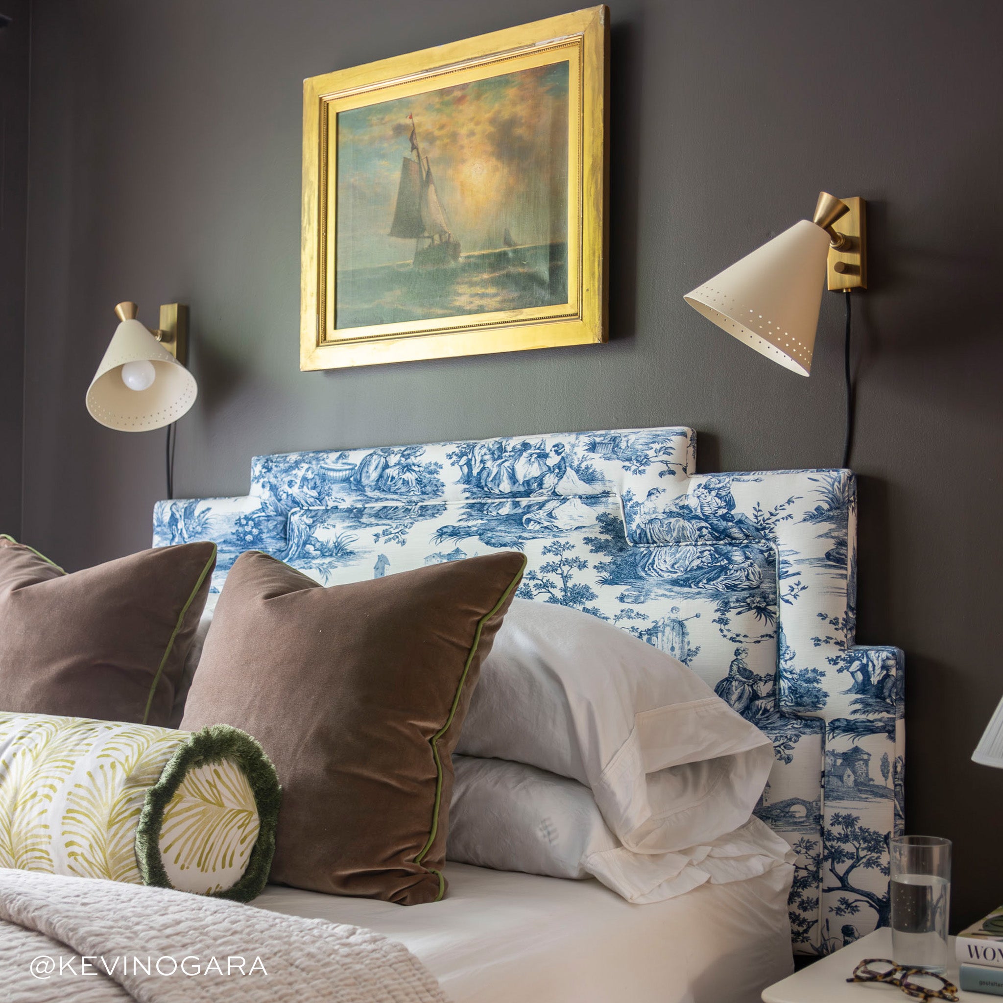 Bed Close-Up styled with two Brown Velvet pillows and a Yellow Stripe Chartreuse Printed Bolster with Sage Fringe. Photo taken by Kevin O'Gara