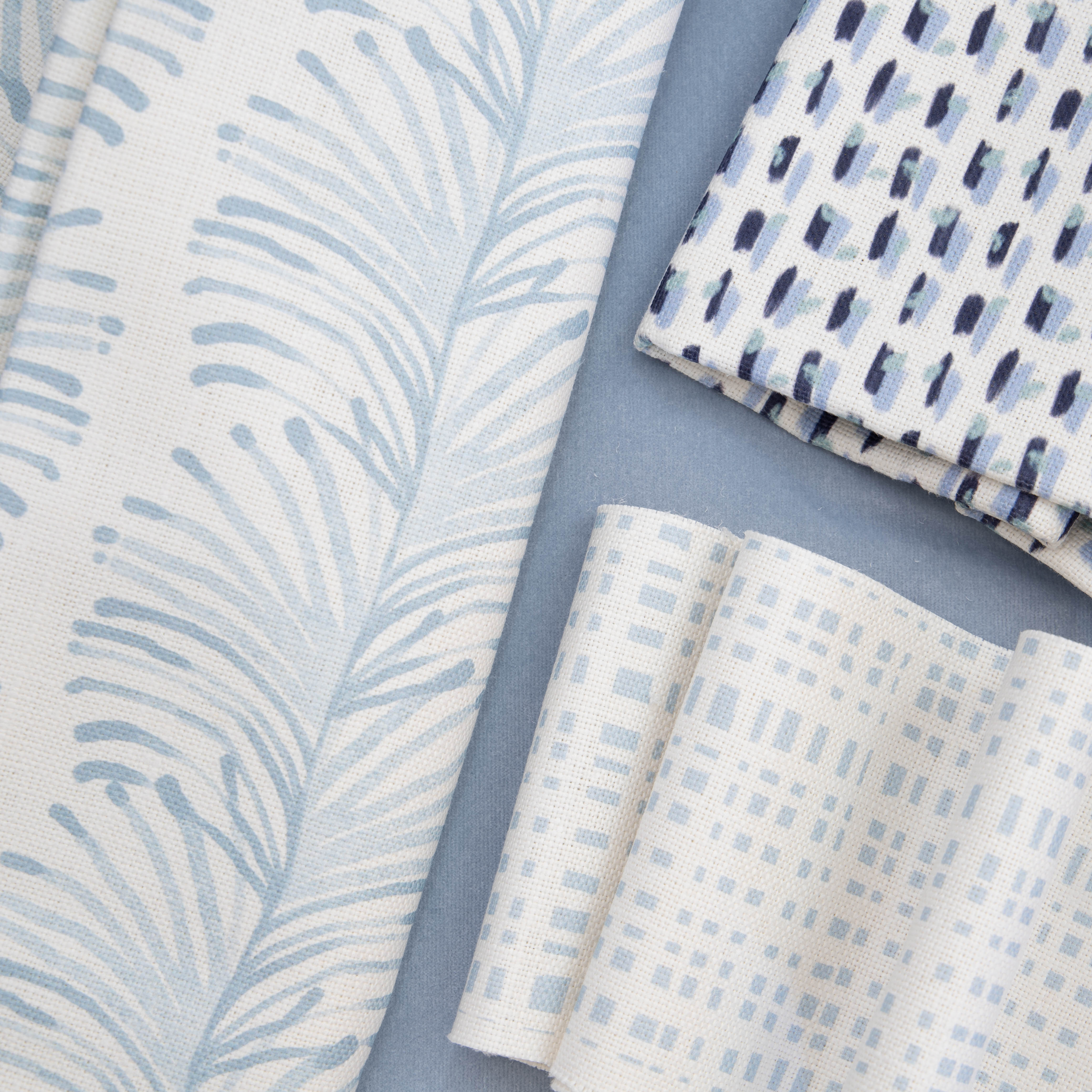 Close-Up Interior design moodboard and fabric inspirations with Sky Blue Gingham Printed Linen Swatch, Sky Blue Botanical Stripe Printed Linen Swatch, Sky Blue Botanical Stripe Printed Linen Swatch