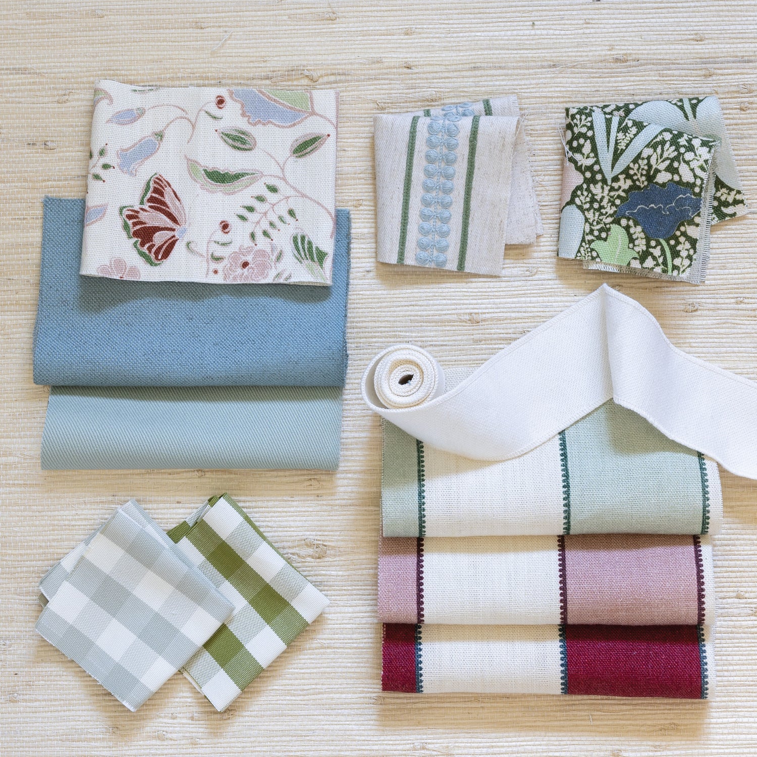 Millie Sage custom fabric samples display soft muted green gingham and textured patterns by Pepper Home.