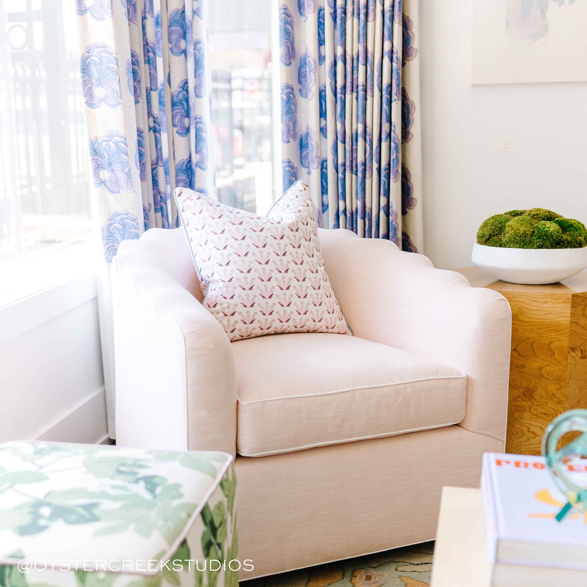 Pink Velvet Sofa Chair Close-up styled with a Pink & Burgundy Drop Repeat Floral Printed Pillow on top. Photo taken by Oyster Creek Studios