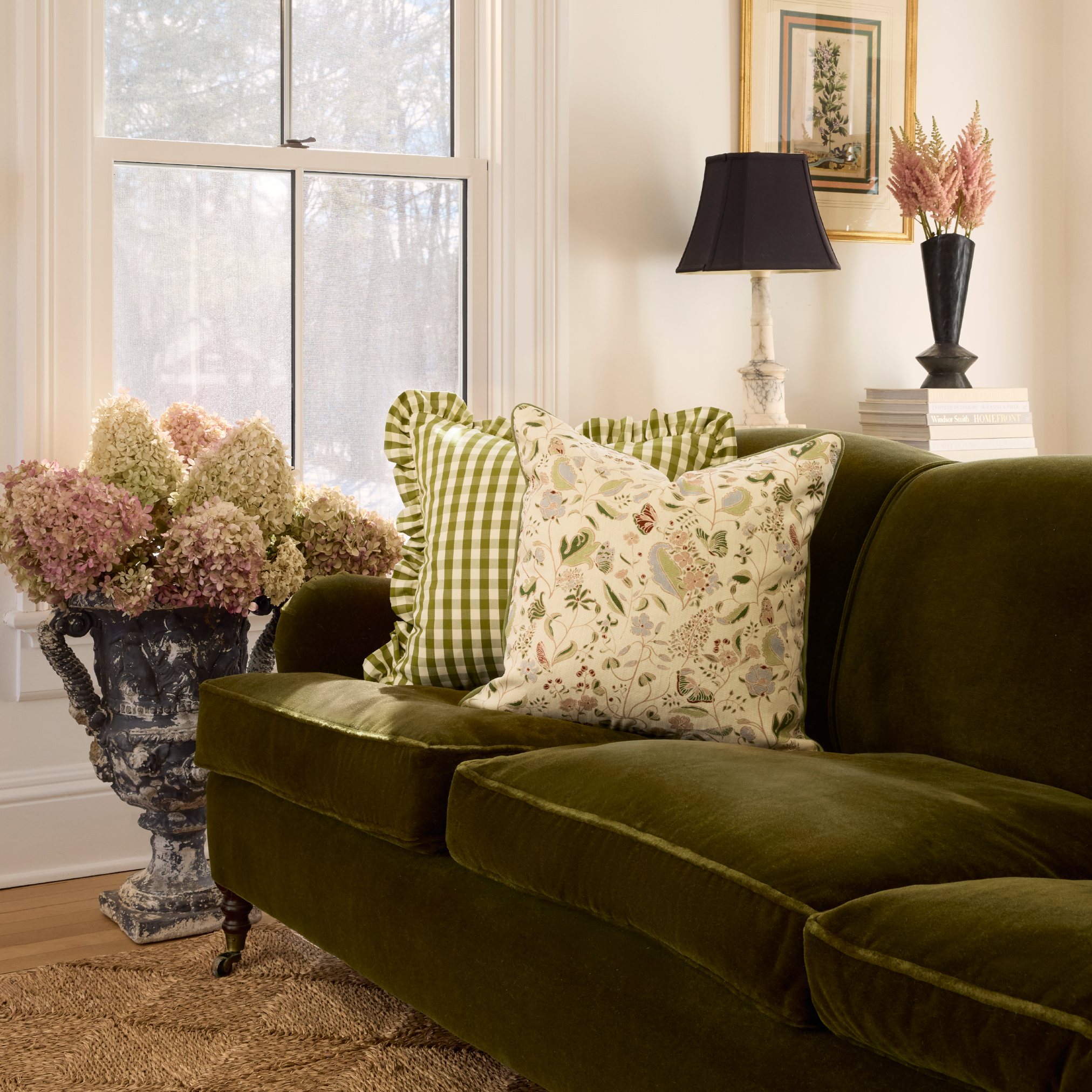 Millie Moss custom green gingham cushions on velvet sofa in bright, inviting living room by Pepper Home.