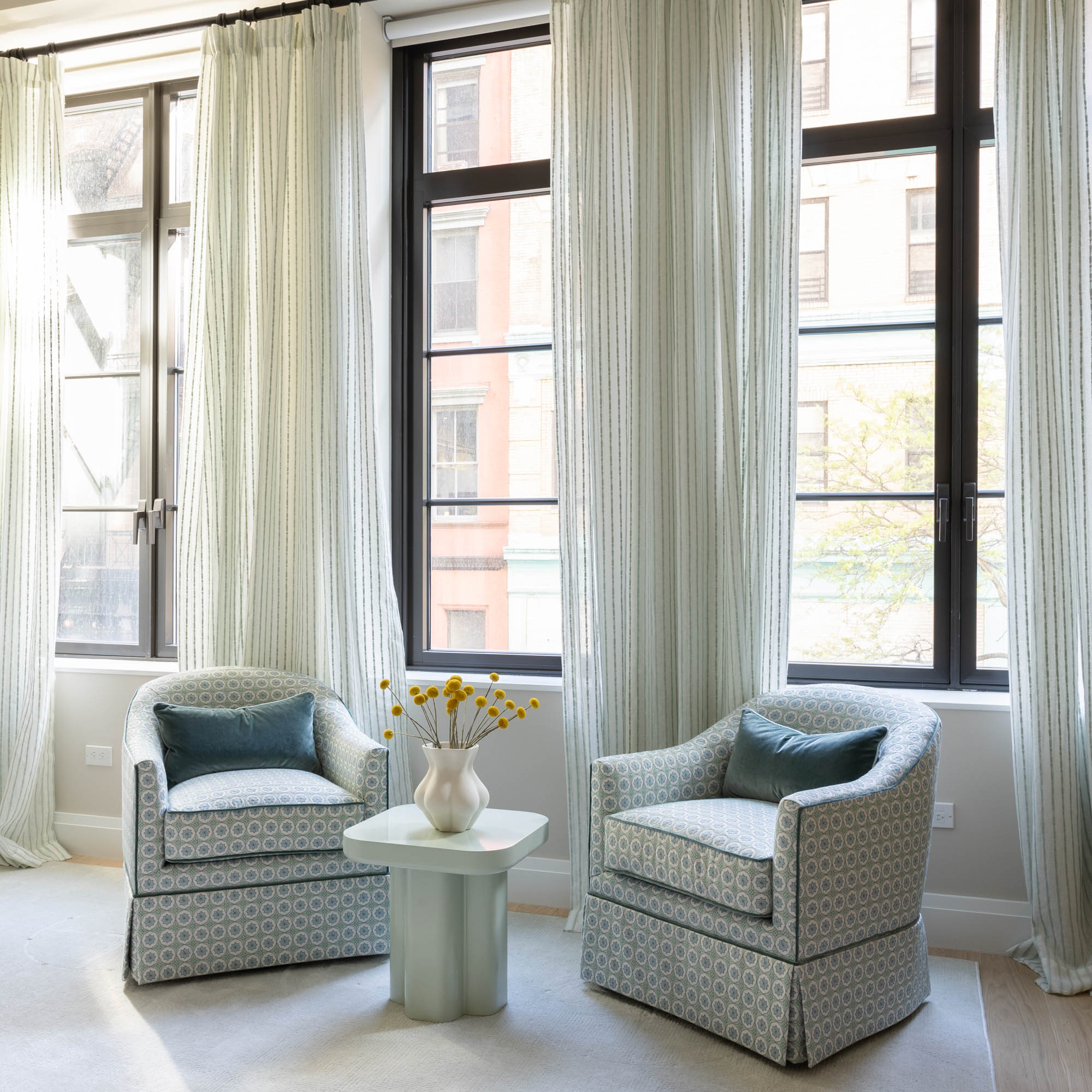Peacock Velvet custom curtains from Pepper Home add bold, opulent teal velvet elegance to any living space.