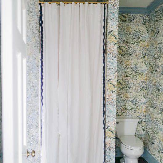 Midnight made-to-order white shower curtain with navy trim, quick delivery, quality crafted and manufactured in the USA