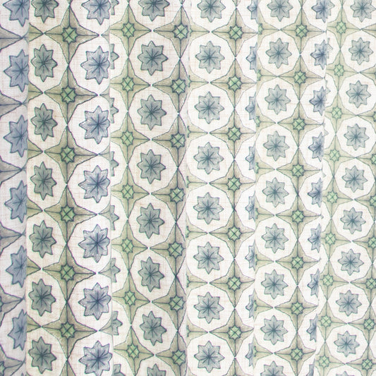 Close-up of Hayes Sea Salt linen blend fabric with intricate geometric embroidery for durable, custom Pepper Home curtains.