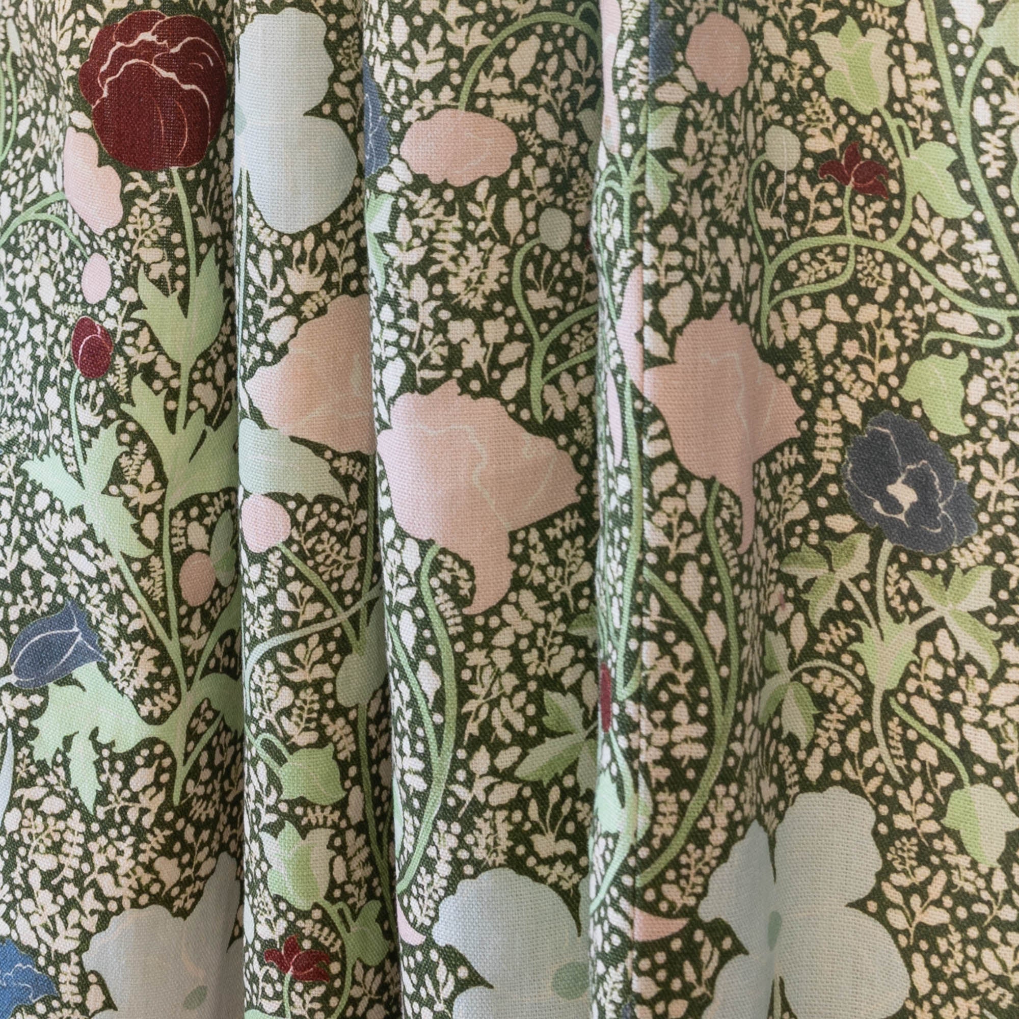 Matilda custom-made curtains with hand-painted floral pattern by Pepper Home, blending pastels and deep neutrals.