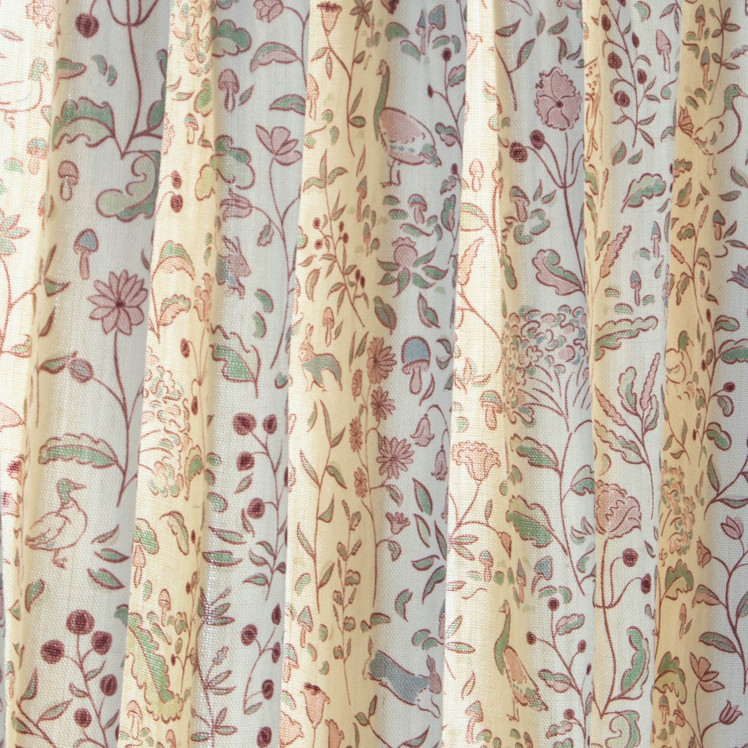 Ruby Burgundy sheer curtains with whimsical woodland and floral patterns by Claire de Quenetain for Pepper Home.