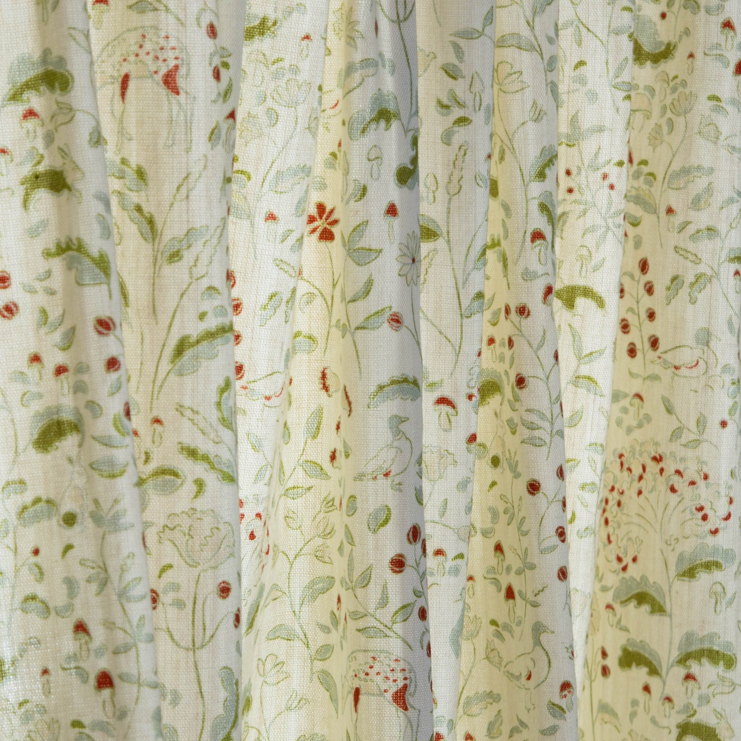 Sheer curtains featuring the Ruby Moss pattern with enchanting florals and woodland creatures by Pepper Home.