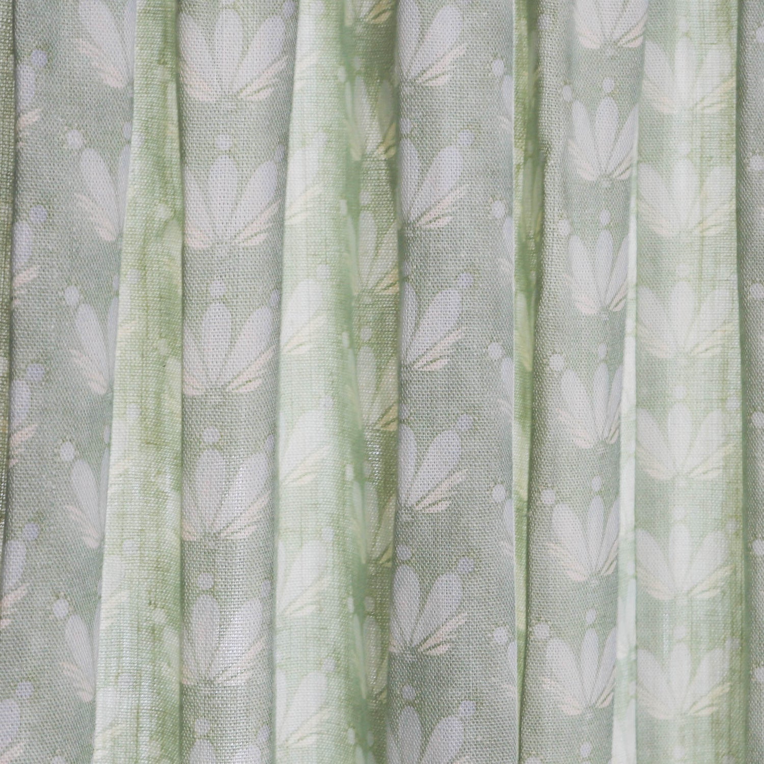Serena Sea Salt sheer curtains by Pepper Home featuring custom hand-painted floral and seashell coastal design in soft blue and sage.