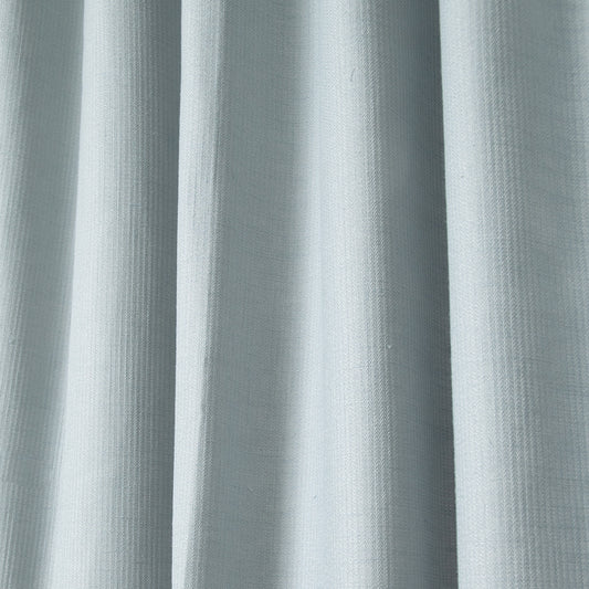 close up of grey blue shower curtain