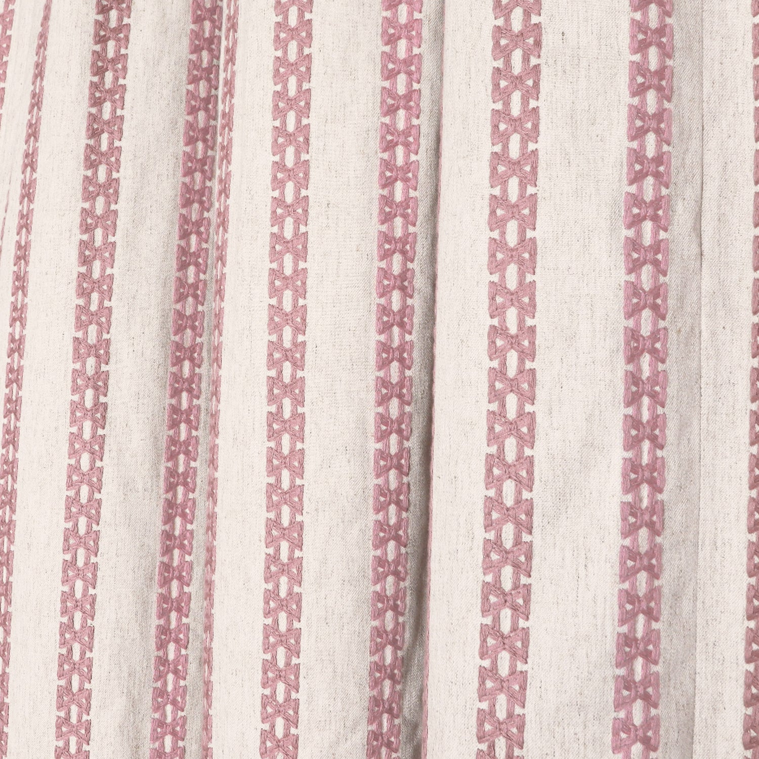 Lilith Unlined custom curtain with soft pink embroidered vertical stripes on sheer white fabric by Pepper Home.