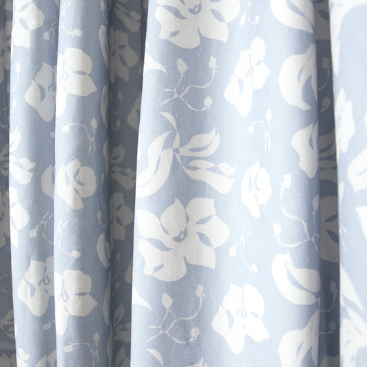 close up of blue floral curtain