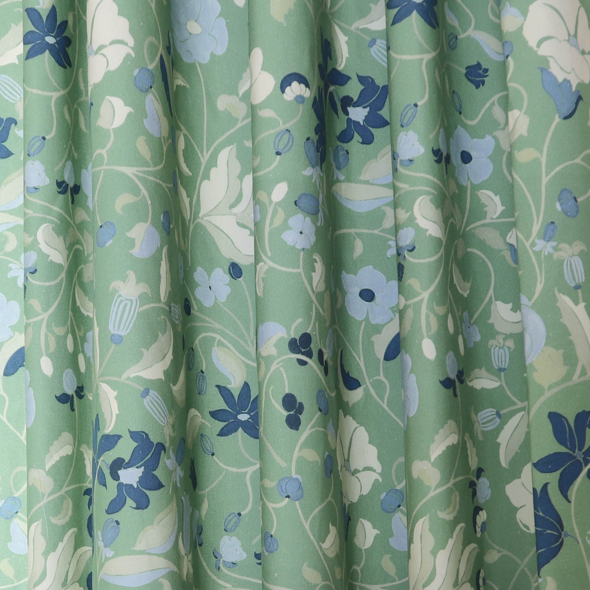 Lulie Parsley Unlined fabric with green and blue floral pattern, a custom made-to-order curtain from Pepper Home.