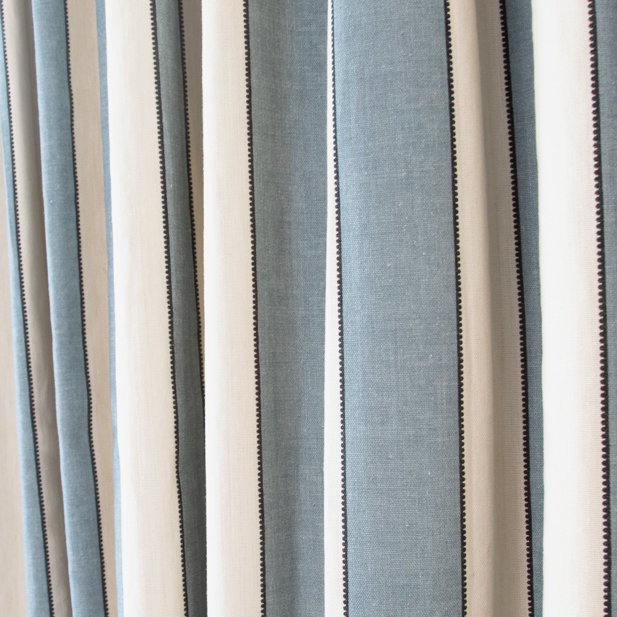 Florence Harbor Tailored Pleat custom curtains showcasing elegant blue and white striped fabric from Pepper Home.