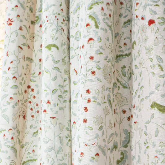 Ruby Moss custom curtains feature enchanting woodland and floral motifs, adding charm and elegance to your home.