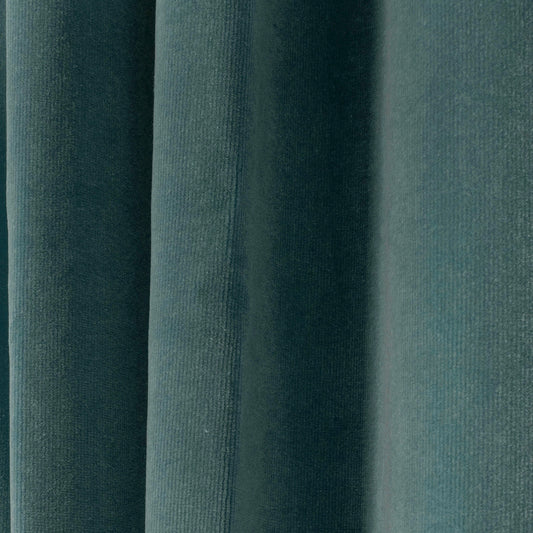 close up of teal blue curtain