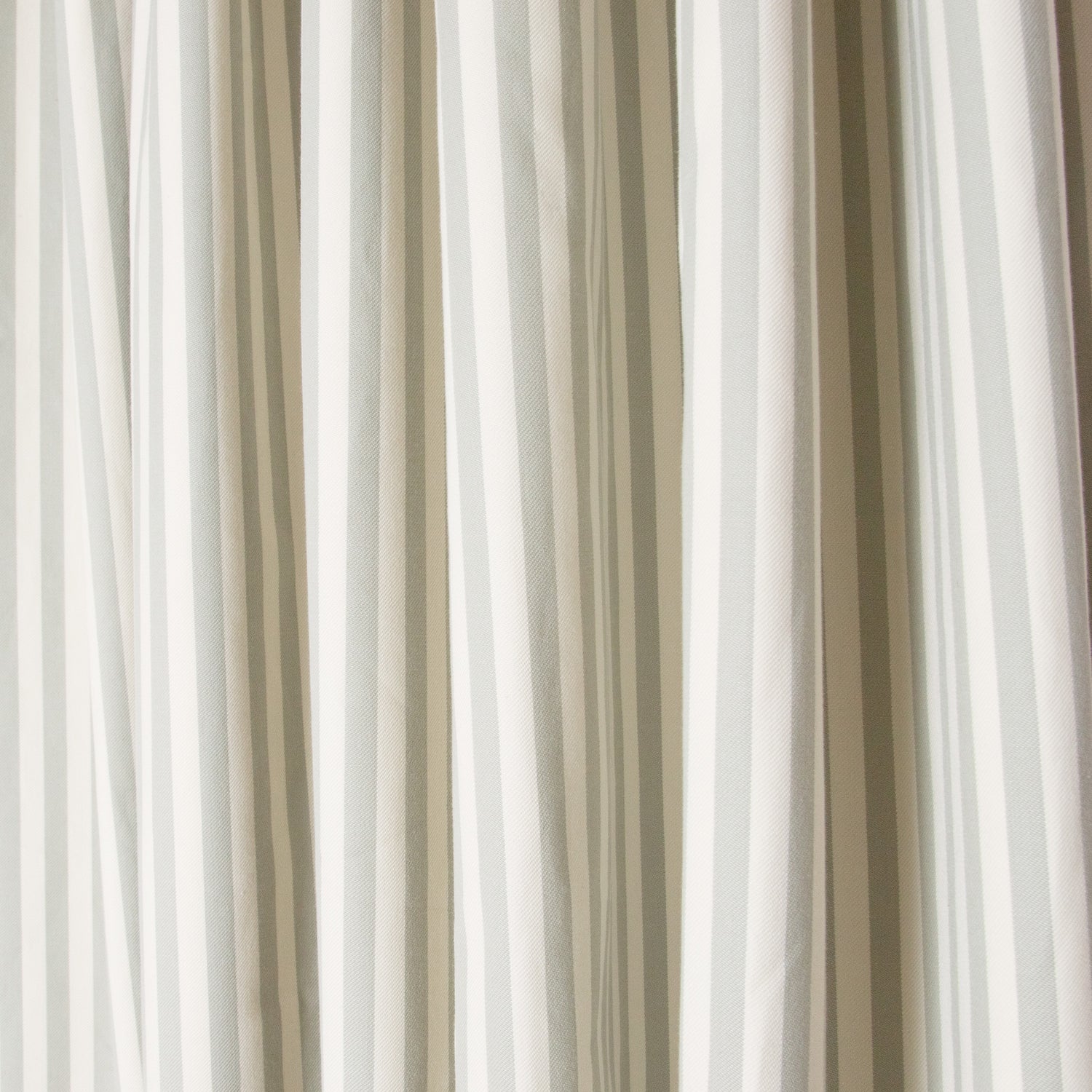 Louisa Sage Unlined custom curtains by Pepper Home showcasing soft vertical stripes in a made-to-order design.