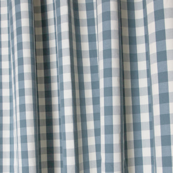 Millie Harbor Unlined custom curtains feature a classic blue and white check pattern for a cozy, made-to-order look.