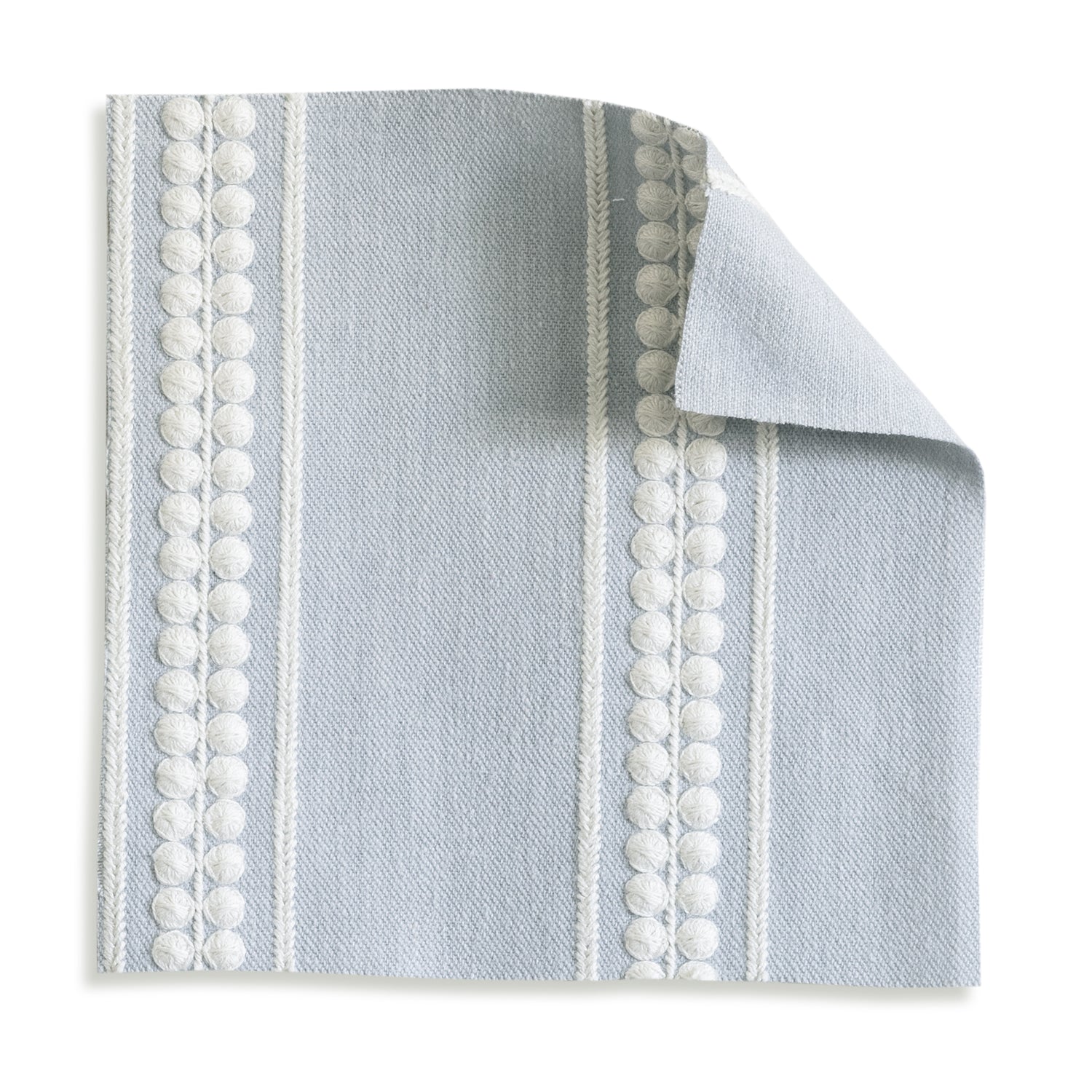 Margot Mist fabric swatch with embroidered pattern, perfect for customizing your Delaney Bed by Pepper Home.
