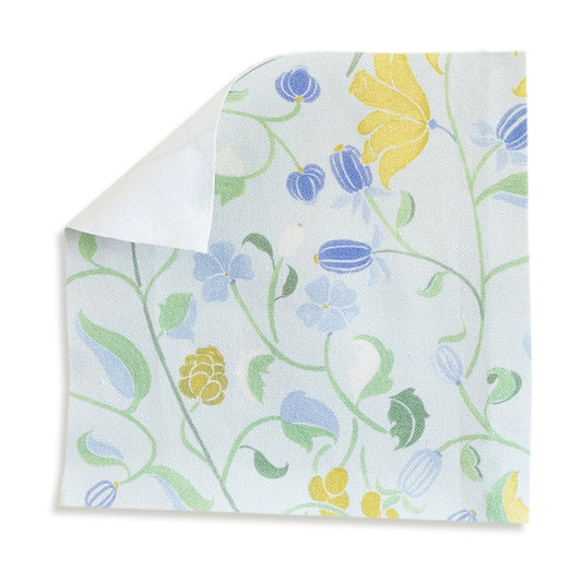 Lulie Eggshell fabric featuring a verdant hand-painted floral pattern for custom Pepper Home sheer curtains.