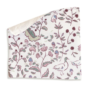 Ruby Burgundy fabric featuring custom hand-painted woodland creatures and floral designs by Claire de Quenetain.