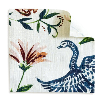 Daphne Cream fabric features majestic peacocks and wildflowers on natural linen, perfect for custom curtains by Pepper Home.