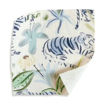 Frida Green fabric swatch with playful tiger and floral design in cool blues and lush greens, perfect for custom curtains.