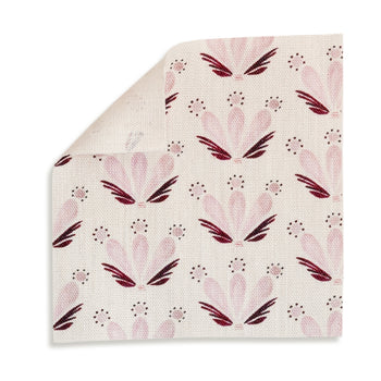 Serena Pink fabric swatch with delicate pink and burgundy floral print on natural linen texture.