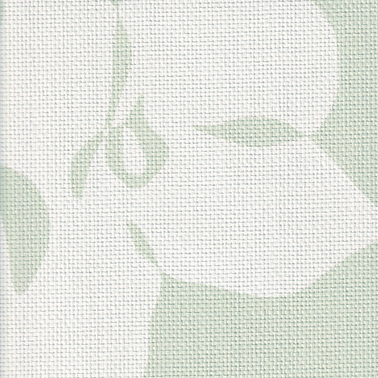 close up of green and white grasscloth wallpaper