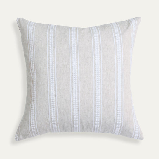 Margot Flour pillow with soft tonal stripes and intricate embroidery, adding subtle texture and elegance to any space.