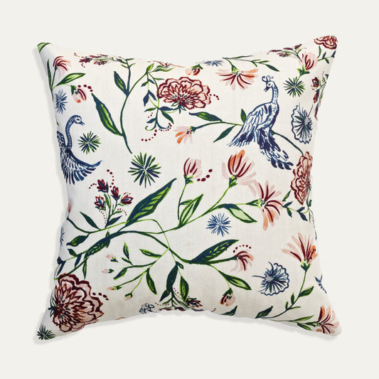 Daphne Cream pillow with custom Pepper Home design featuring peacocks and wildflowers on linen fabric.