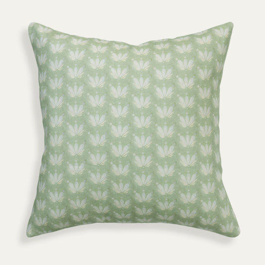 Serena Sea Salt pillow with hand-painted floral and seashell pattern in soft sage for a serene coastal look.
