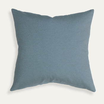 Harbor pillow in custom, airy blue linen blend fabric by Pepper Home, perfect for adding depth and style to any space.