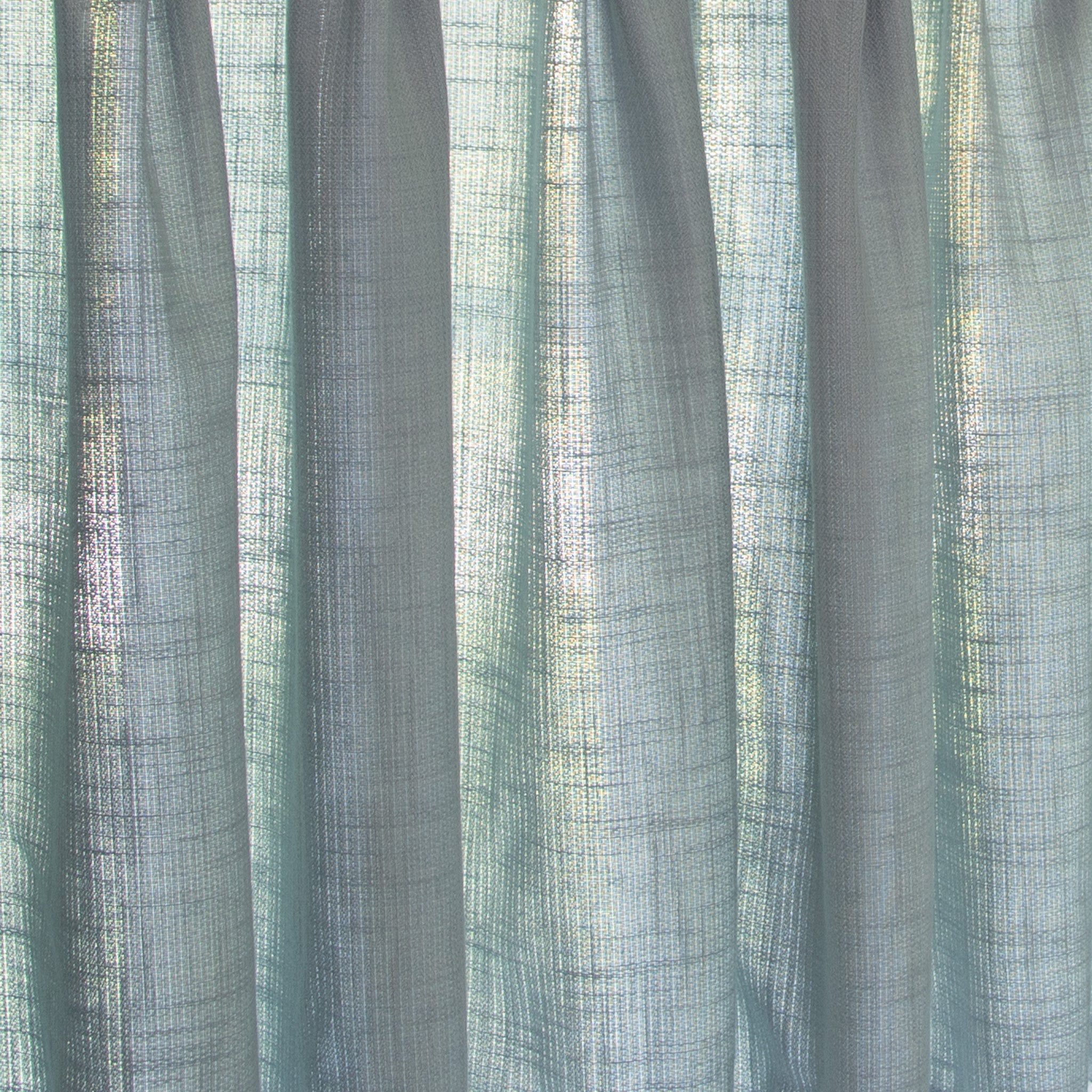 close up of grey blue fabric curtain