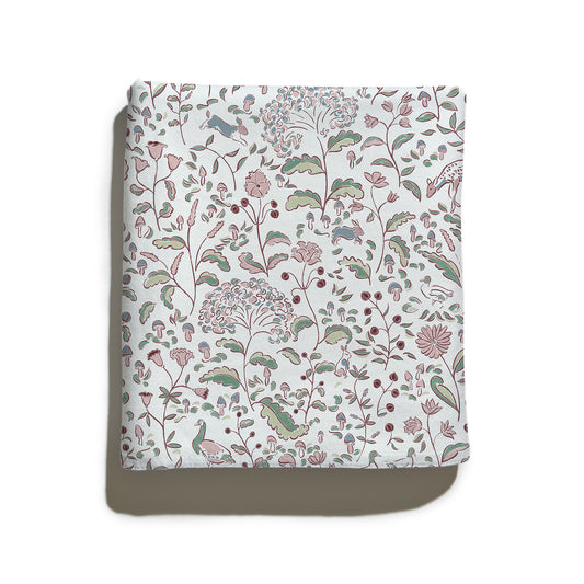 Ruby Burgundy fabric featuring whimsical woodland creatures and floral motifs, perfect for custom Pepper Home curtains.