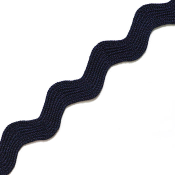 Close-up of midnight blue custom rick rack trim with a textured wave pattern for elegant curtain detailing.