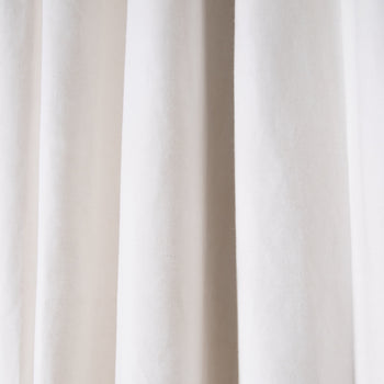 Close-up of custom Flour curtain fabric in soft ivory linen-cotton blend with subtle textured weave by Pepper Home