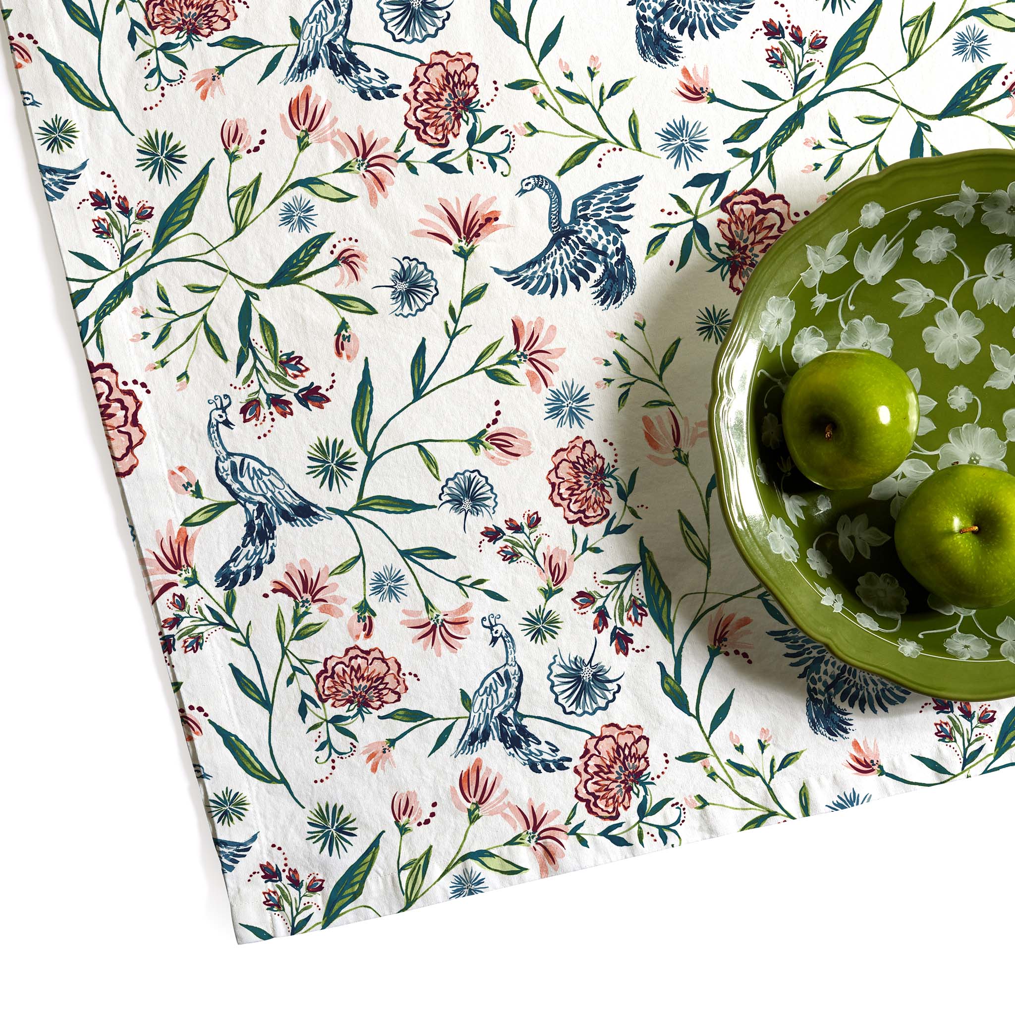 Cream Chinoiserie Printed Tablecloth Close-Up with two apples inside a green floral plate