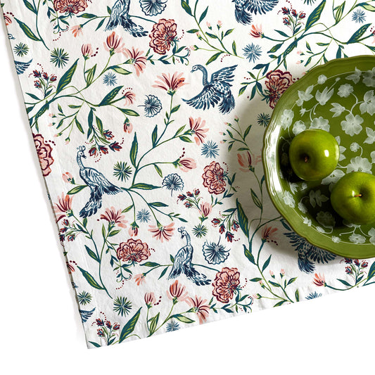 Cream Chinoiserie Printed Tablecloth Close-Up with two apples inside a green floral plate