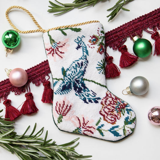 Pink navy and white chinoiserie mini stocking styled with raspberry tassel and mini round christmas ornaments