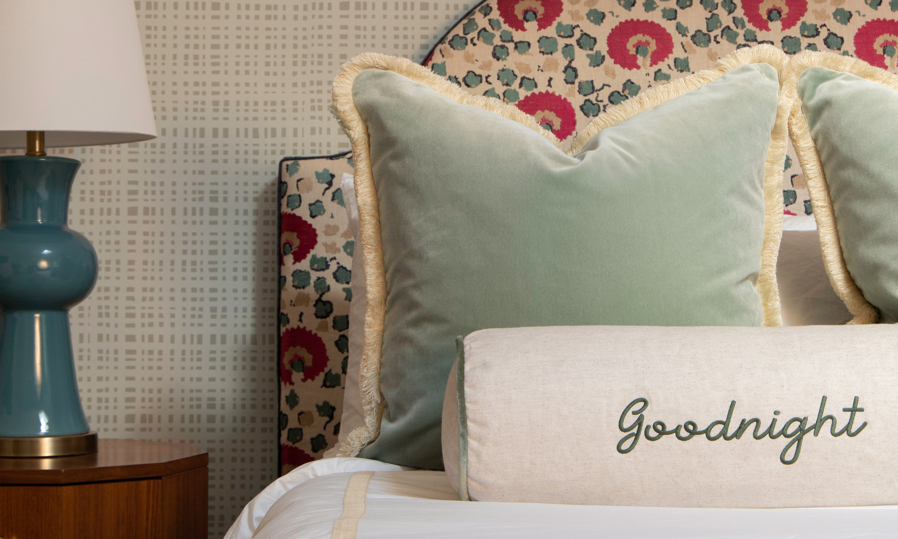 Bed with Sea Salt Velvet Pillows and Goodnight Embroidered Pillow