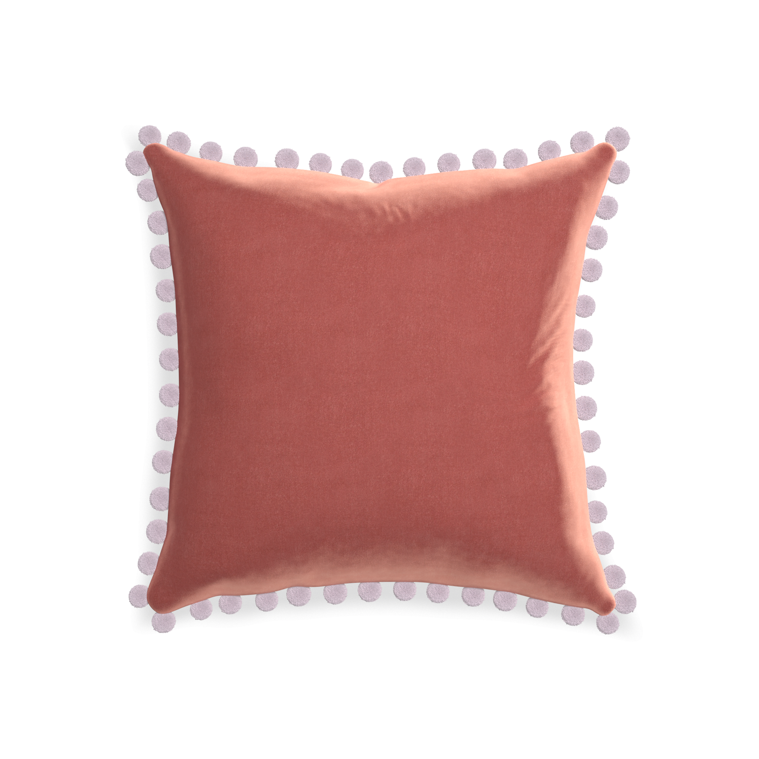 square coral velvet pillow with lilac pom poms