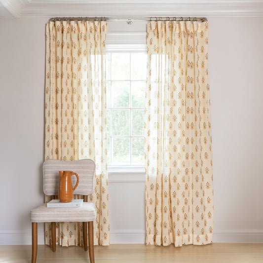 Lucie Clay Tailored Pleat sheer curtains with subtle floral pattern on cream, made-to-order, short lead times, USA quality craftsmanship
