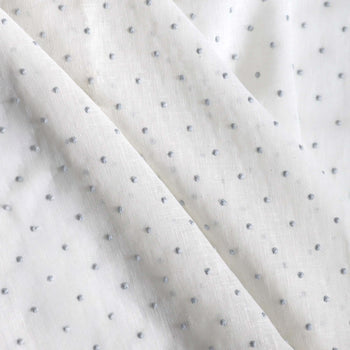 sheer white embroidered blue polka dot fabric