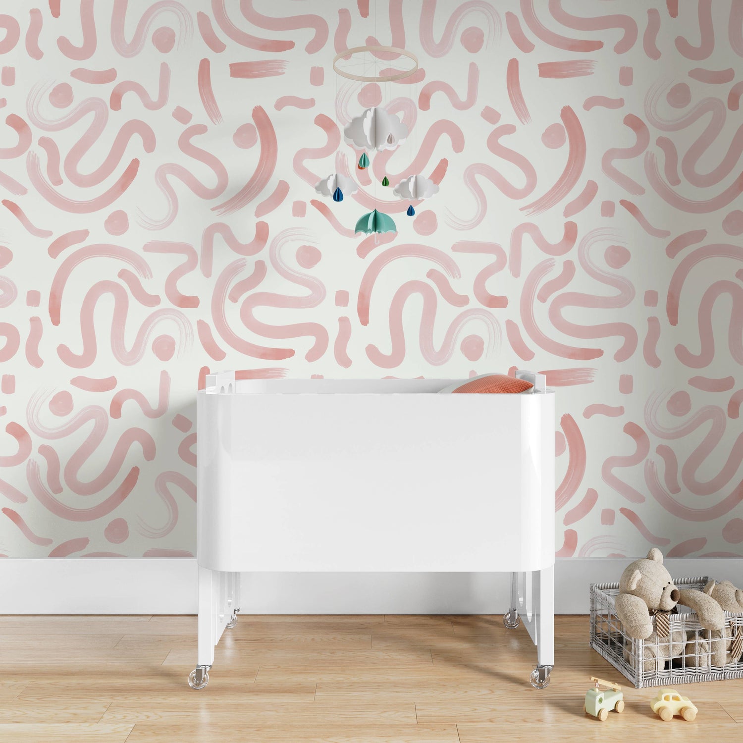 White Crib Close-up styled with Pink Graphic Printed Wallpaper
