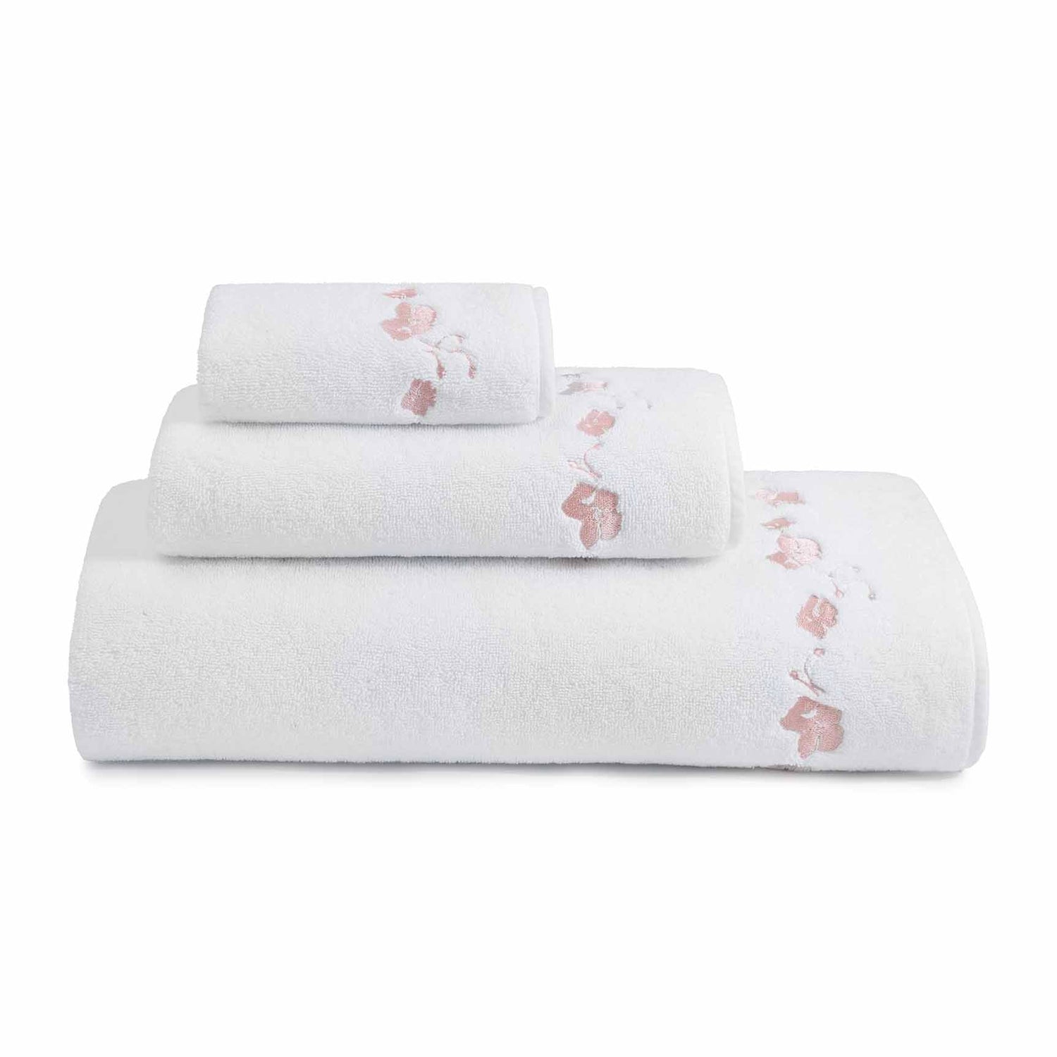 stack of different sized white towels with pink embroidered botanical stripe patttern
