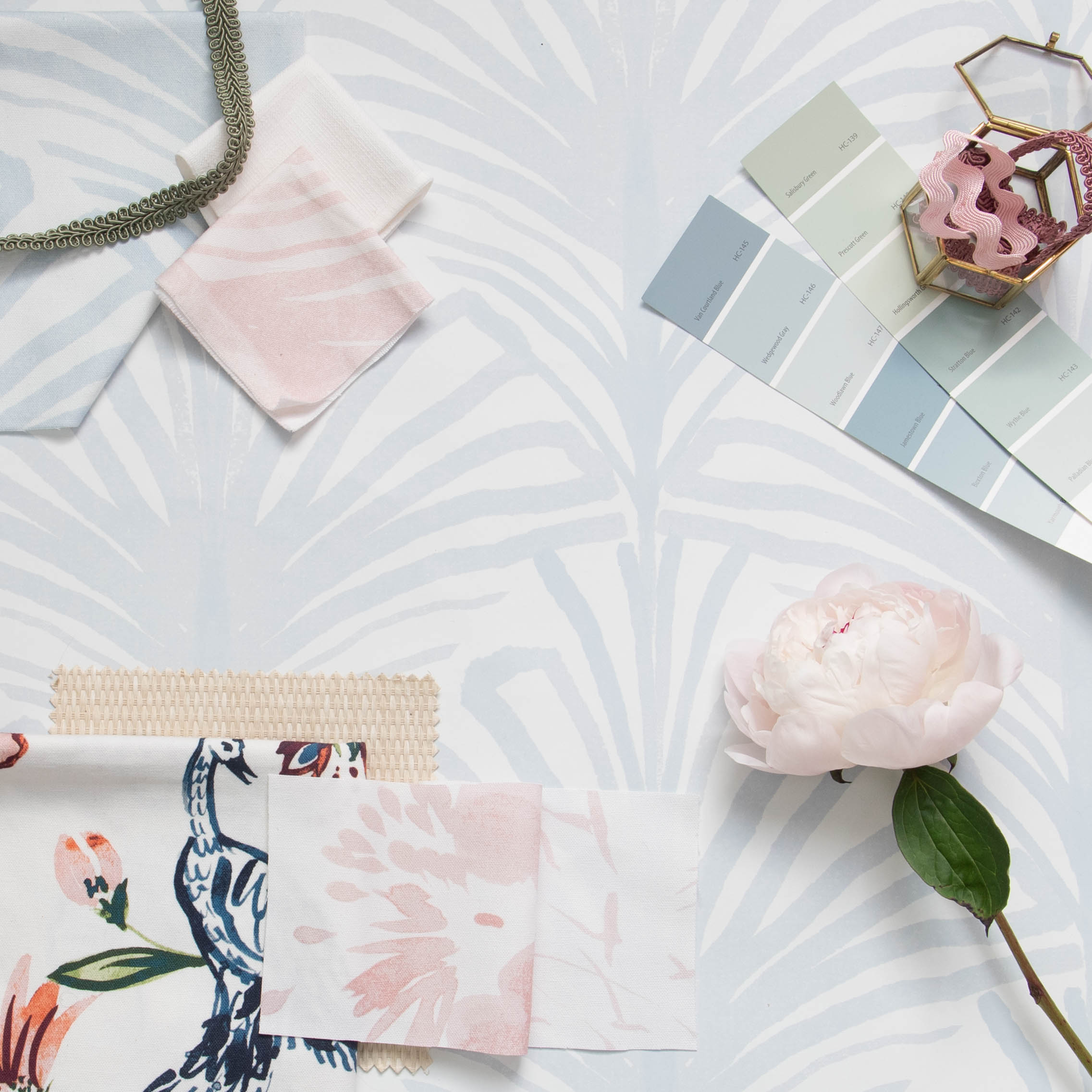 Interior design moodboard and fabric inspirations with Sky Blue Palm wallpaper, Sky Blue Palm printed cotton swatch, Rose Pink Palm printed cotton swatch, and Cream Chinoiserie cotton swatch