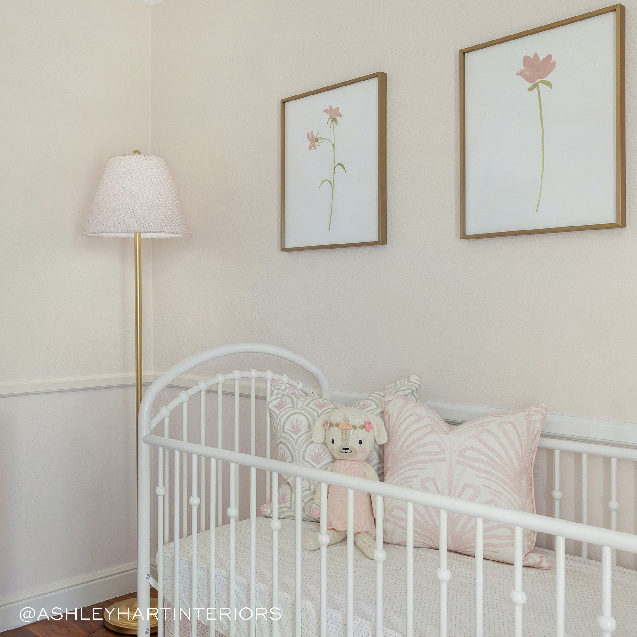 Nursery crib styled with a Pink & Green Palm Printed Pillow and a Rose Pink Palm Printed Pillow. Photo taken by Ashley Hart Interiors