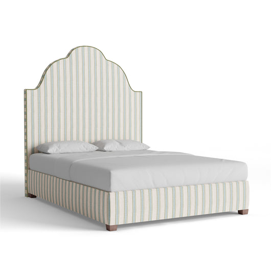 Regina Bed in Margot Fern fabric with custom tailored curved silhouette for a sophisticated bedroom centerpiece.