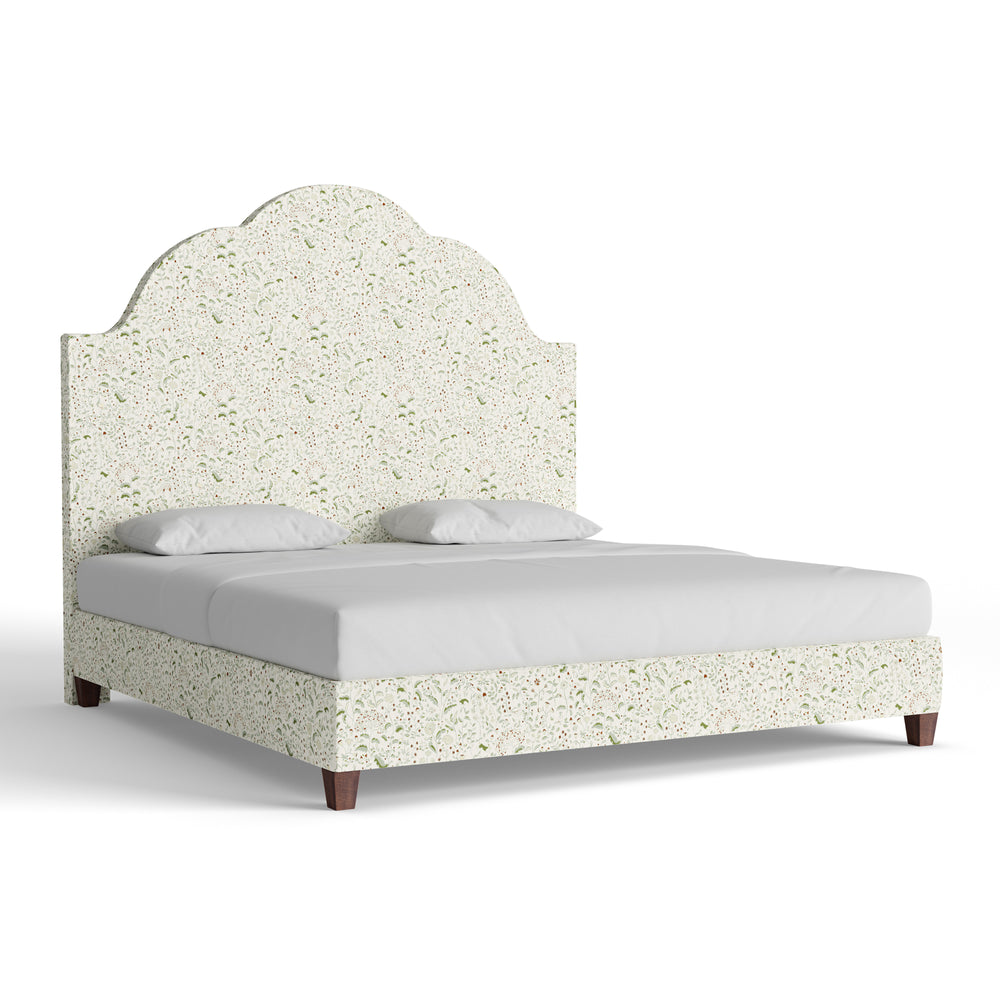 Patterned upholstered twin size bed with ornate curved headboard and matching panels in speckled cream fabric.
