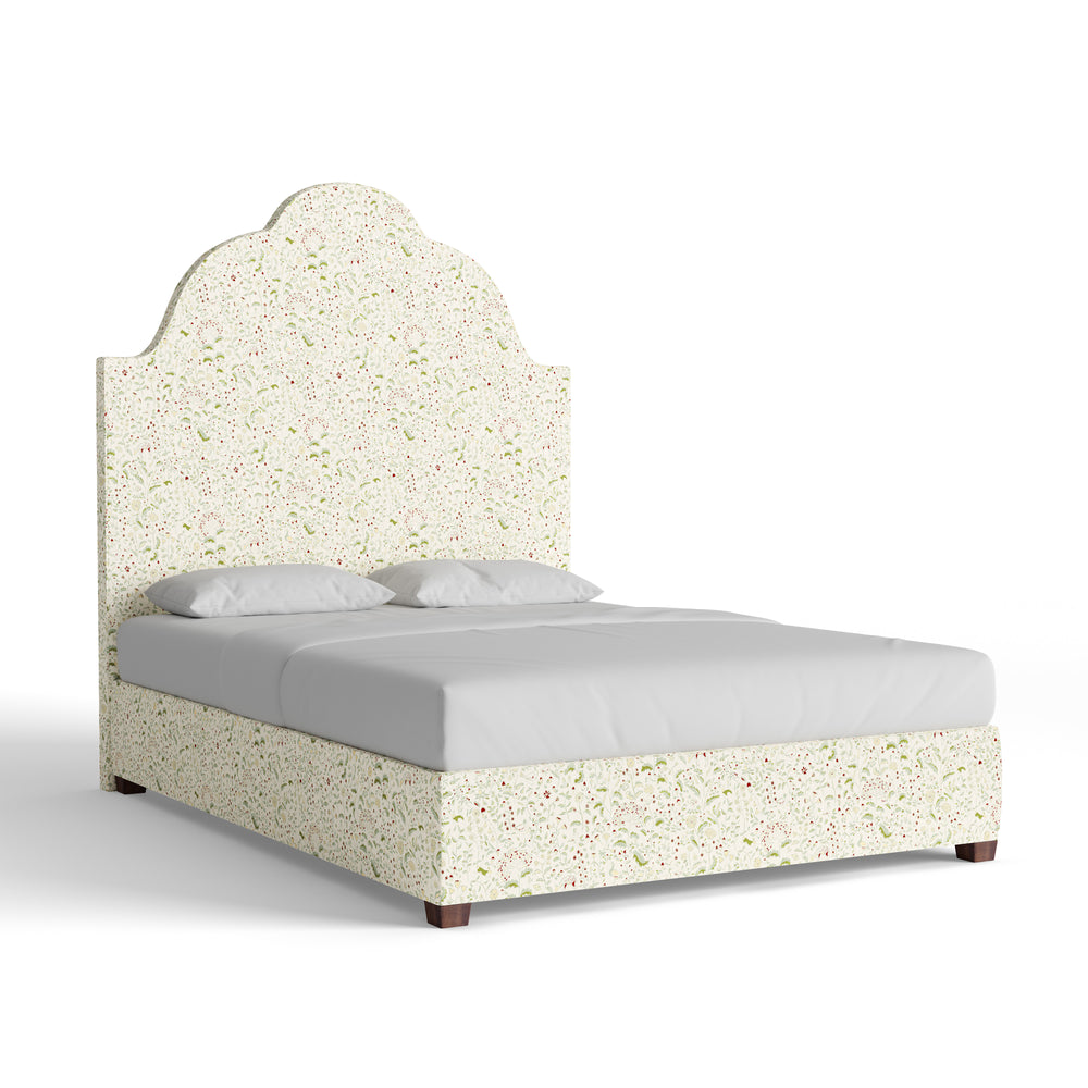 Close-up corner of the speckled cream patterned bed fabric showing texture and floral specks.